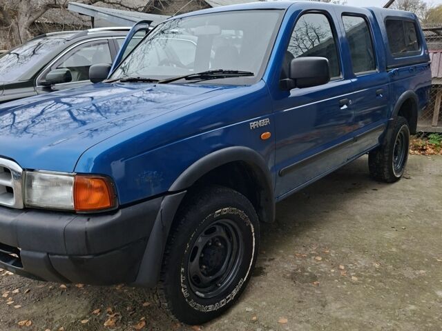 Синій Ніссан Навара, об'ємом двигуна 0 л та пробігом 161 тис. км за 5800 $, фото 4 на Automoto.ua