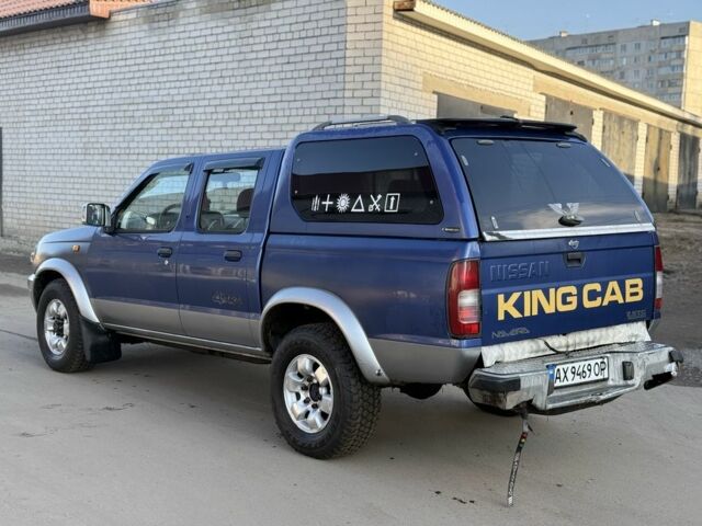 Синий Ниссан Навара, объемом двигателя 2.5 л и пробегом 250 тыс. км за 4200 $, фото 1 на Automoto.ua