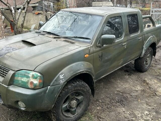 Синий Ниссан Навара, объемом двигателя 2.5 л и пробегом 281 тыс. км за 4000 $, фото 4 на Automoto.ua