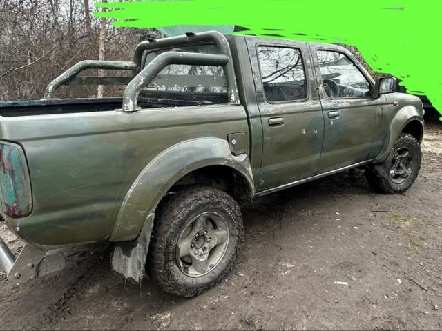 Синий Ниссан Навара, объемом двигателя 2.5 л и пробегом 281 тыс. км за 4000 $, фото 2 на Automoto.ua