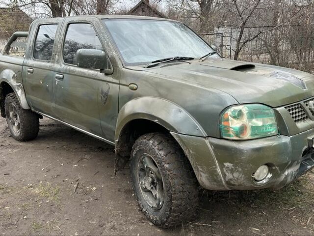 Синий Ниссан Навара, объемом двигателя 2.5 л и пробегом 281 тыс. км за 4000 $, фото 1 на Automoto.ua