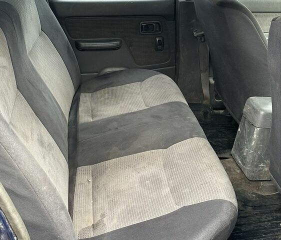 Синий Ниссан Навара, объемом двигателя 2.5 л и пробегом 281 тыс. км за 4000 $, фото 5 на Automoto.ua