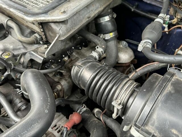 Синий Ниссан Навара, объемом двигателя 2.5 л и пробегом 281 тыс. км за 4000 $, фото 9 на Automoto.ua