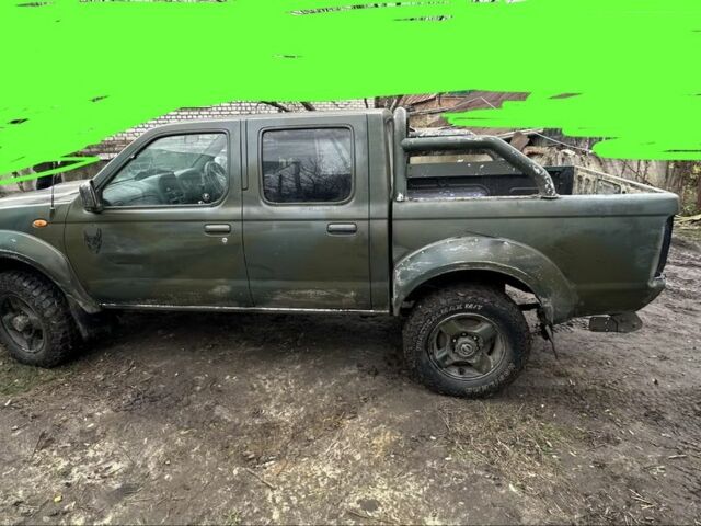 Синий Ниссан Навара, объемом двигателя 2.5 л и пробегом 281 тыс. км за 4000 $, фото 3 на Automoto.ua