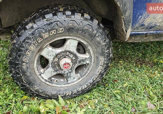 Синій Ніссан Навара, об'ємом двигуна 2.5 л та пробігом 316 тис. км за 7246 $, фото 8 на Automoto.ua