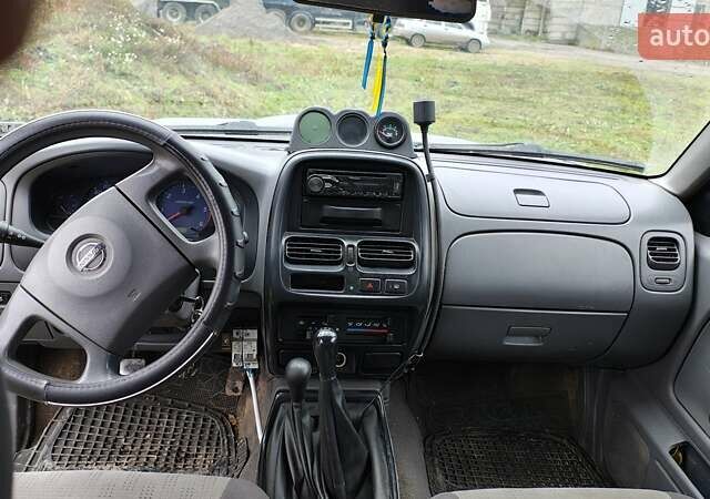 Синій Ніссан Навара, об'ємом двигуна 2.5 л та пробігом 316 тис. км за 7246 $, фото 10 на Automoto.ua