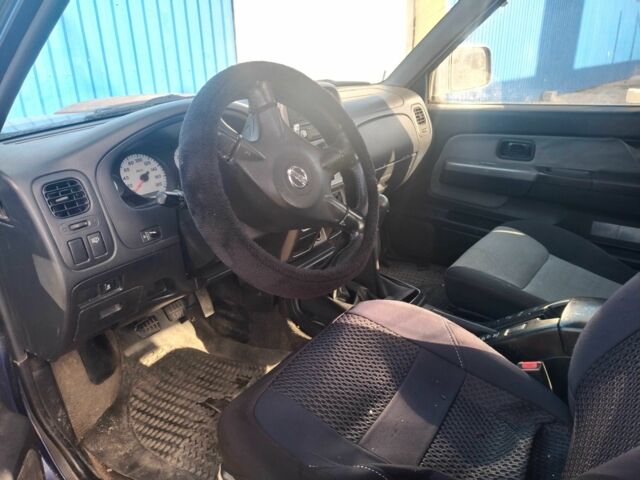 Синий Ниссан Навара, объемом двигателя 2.5 л и пробегом 250 тыс. км за 5213 $, фото 1 на Automoto.ua