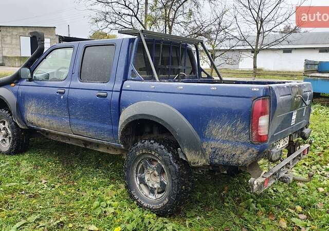 Синій Ніссан Навара, об'ємом двигуна 2.5 л та пробігом 316 тис. км за 7246 $, фото 2 на Automoto.ua