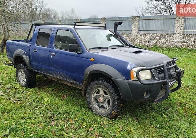 Синій Ніссан Навара, об'ємом двигуна 2.5 л та пробігом 316 тис. км за 7246 $, фото 1 на Automoto.ua