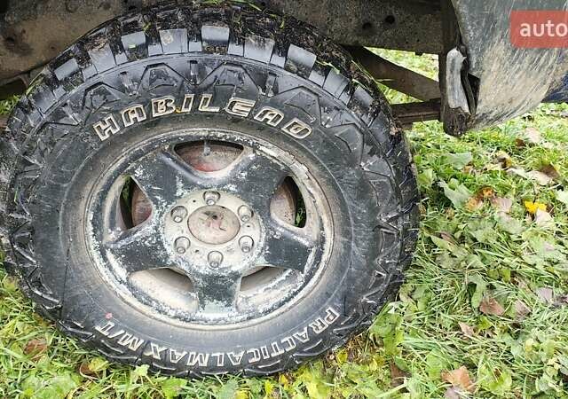 Синій Ніссан Навара, об'ємом двигуна 2.5 л та пробігом 316 тис. км за 7246 $, фото 5 на Automoto.ua