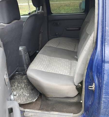 Синій Ніссан Навара, об'ємом двигуна 2.5 л та пробігом 316 тис. км за 7246 $, фото 9 на Automoto.ua