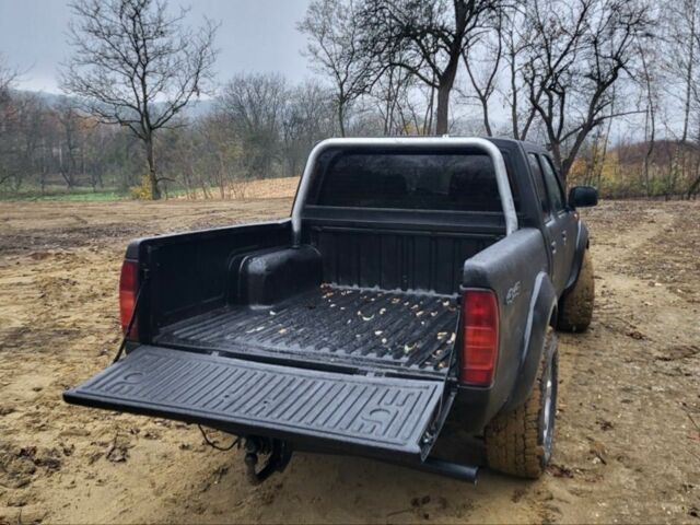 Синий Ниссан Навара, объемом двигателя 2.5 л и пробегом 208 тыс. км за 2600 $, фото 4 на Automoto.ua