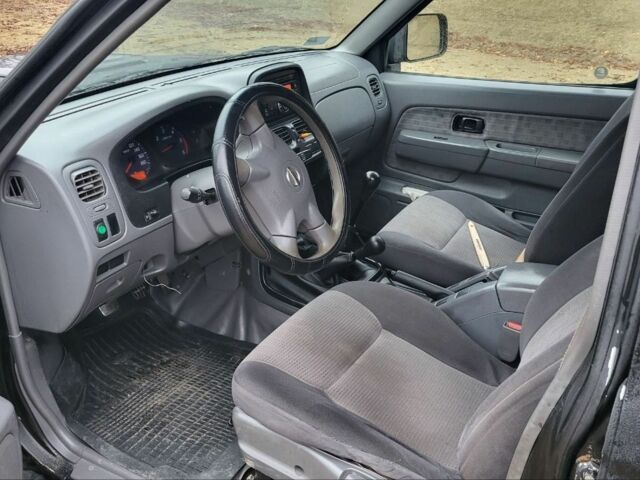 Синий Ниссан Навара, объемом двигателя 2.5 л и пробегом 208 тыс. км за 2600 $, фото 6 на Automoto.ua