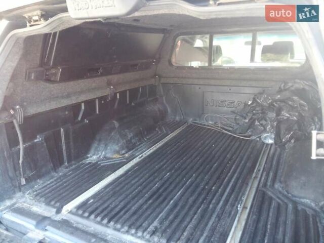 Синий Ниссан Навара, объемом двигателя 2.49 л и пробегом 369 тыс. км за 11900 $, фото 1 на Automoto.ua