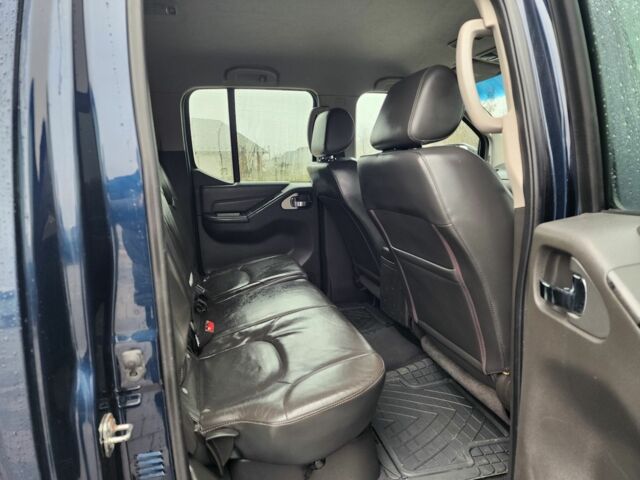 Синій Ніссан Навара, об'ємом двигуна 2.5 л та пробігом 166 тис. км за 7628 $, фото 21 на Automoto.ua