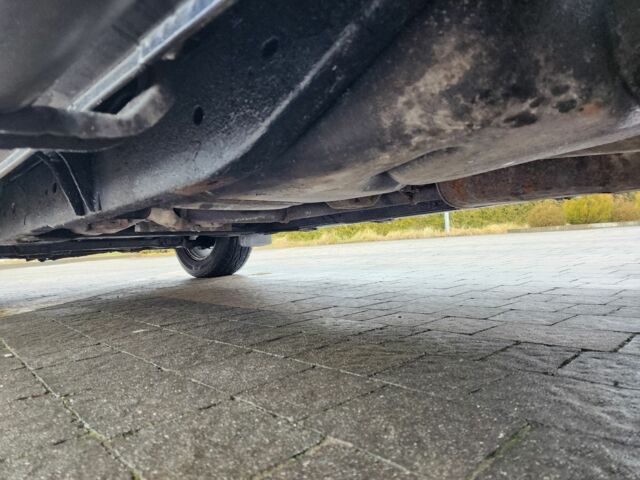 Синій Ніссан Навара, об'ємом двигуна 2.5 л та пробігом 166 тис. км за 7628 $, фото 23 на Automoto.ua