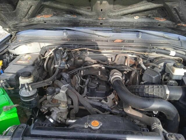 Синий Ниссан Навара, объемом двигателя 2.5 л и пробегом 350 тыс. км за 5500 $, фото 4 на Automoto.ua