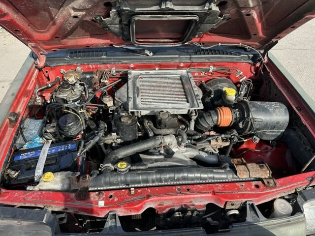 Зелений Ніссан Навара, об'ємом двигуна 2.5 л та пробігом 270 тис. км за 3650 $, фото 5 на Automoto.ua