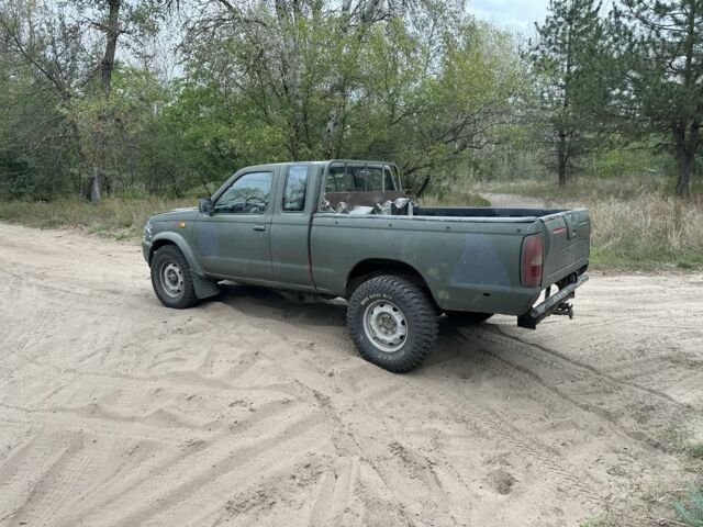 Зелений Ніссан Навара, об'ємом двигуна 2.5 л та пробігом 270 тис. км за 3650 $, фото 4 на Automoto.ua