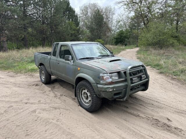 Зелений Ніссан Навара, об'ємом двигуна 2.5 л та пробігом 270 тис. км за 3650 $, фото 2 на Automoto.ua