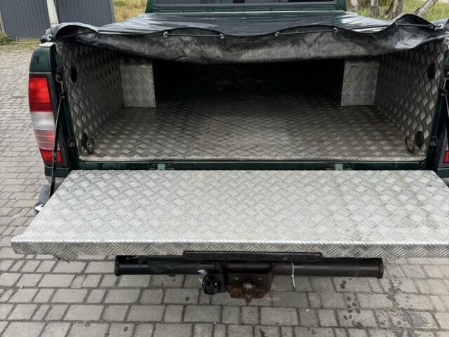 Зеленый Ниссан Навара, объемом двигателя 2.5 л и пробегом 250 тыс. км за 5300 $, фото 6 на Automoto.ua