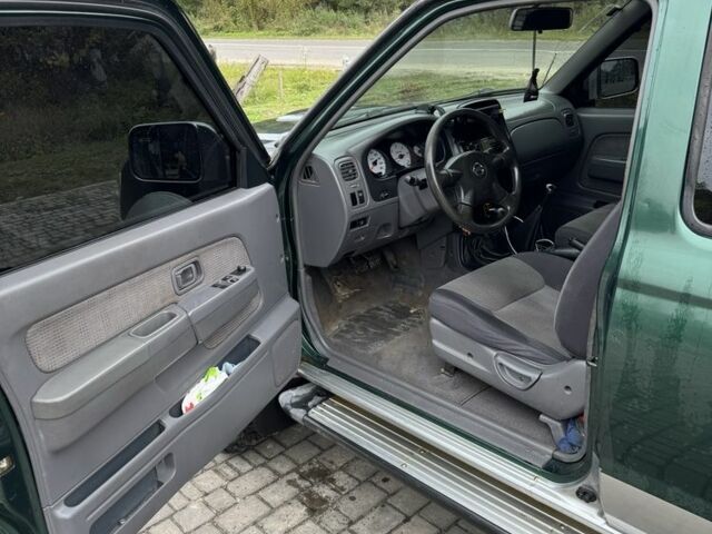 Зеленый Ниссан Навара, объемом двигателя 2.5 л и пробегом 250 тыс. км за 5700 $, фото 4 на Automoto.ua