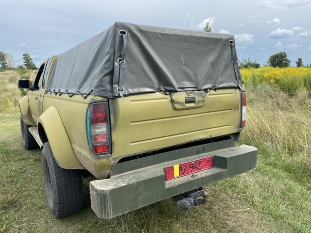 Зелений Ніссан Навара, об'ємом двигуна 2.5 л та пробігом 280 тис. км за 5300 $, фото 5 на Automoto.ua