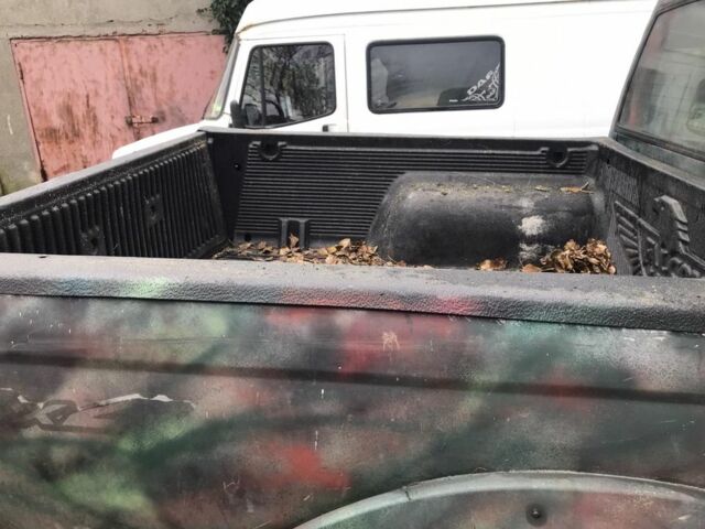 Зеленый Ниссан Навара, объемом двигателя 2.5 л и пробегом 250 тыс. км за 2700 $, фото 4 на Automoto.ua