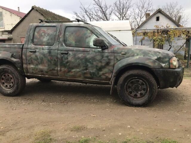 Зеленый Ниссан Навара, объемом двигателя 2.5 л и пробегом 250 тыс. км за 2700 $, фото 2 на Automoto.ua