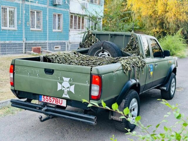 Зеленый Ниссан Навара, объемом двигателя 2.5 л и пробегом 200 тыс. км за 4200 $, фото 18 на Automoto.ua