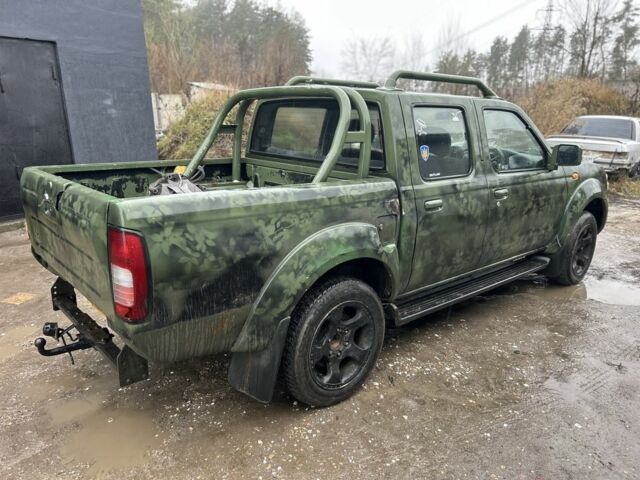 Зеленый Ниссан Навара, объемом двигателя 2.5 л и пробегом 110 тыс. км за 3750 $, фото 1 на Automoto.ua