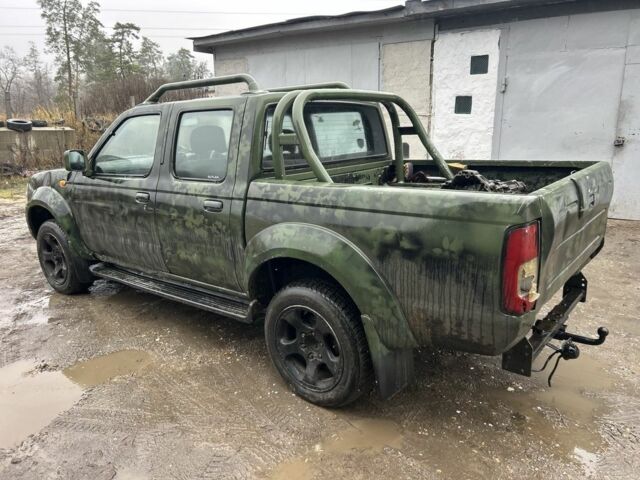 Зеленый Ниссан Навара, объемом двигателя 2.5 л и пробегом 110 тыс. км за 3750 $, фото 2 на Automoto.ua