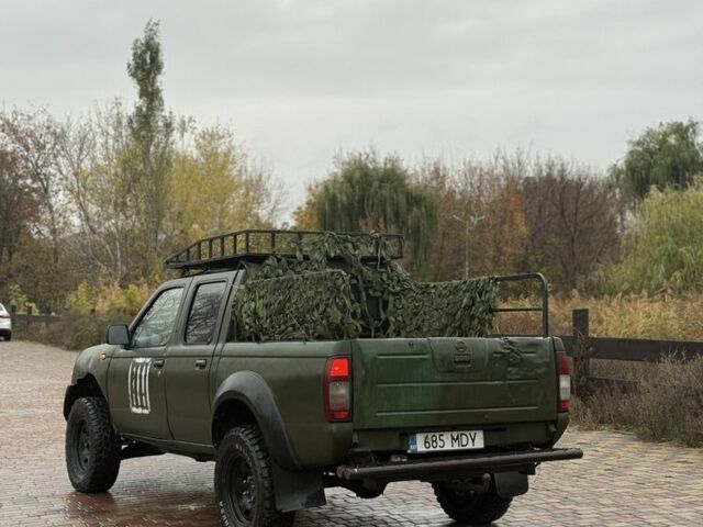 Зеленый Ниссан Навара, объемом двигателя 2.5 л и пробегом 189 тыс. км за 4200 $, фото 4 на Automoto.ua