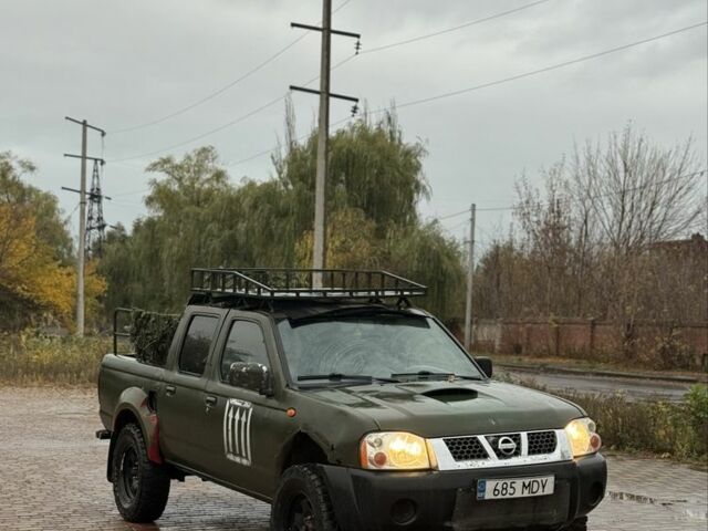 Зеленый Ниссан Навара, объемом двигателя 2.5 л и пробегом 189 тыс. км за 4200 $, фото 2 на Automoto.ua
