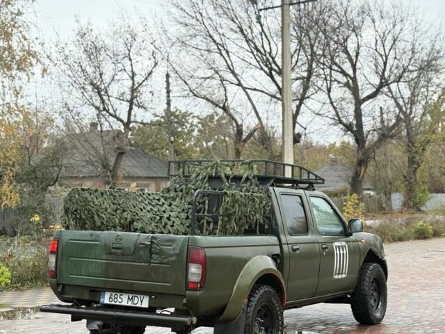 Зеленый Ниссан Навара, объемом двигателя 2.5 л и пробегом 189 тыс. км за 4200 $, фото 3 на Automoto.ua