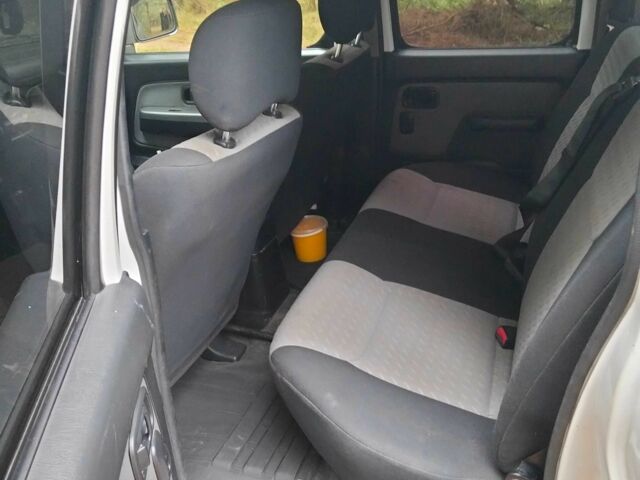 Зеленый Ниссан Навара, объемом двигателя 2.5 л и пробегом 261 тыс. км за 5001 $, фото 7 на Automoto.ua