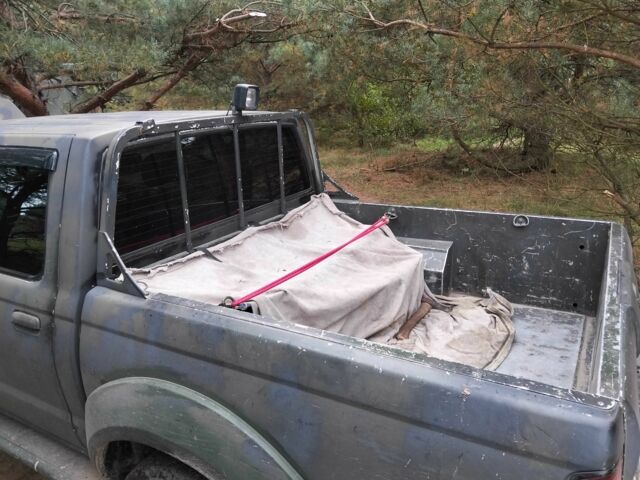 Зеленый Ниссан Навара, объемом двигателя 2.5 л и пробегом 261 тыс. км за 5001 $, фото 1 на Automoto.ua