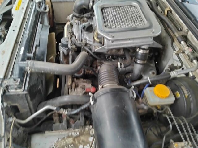 Зеленый Ниссан Навара, объемом двигателя 2.5 л и пробегом 261 тыс. км за 5001 $, фото 2 на Automoto.ua