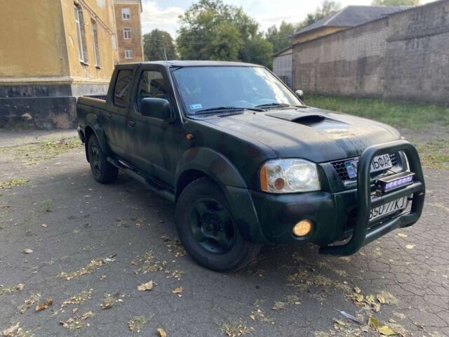 Зеленый Ниссан Навара, объемом двигателя 2.5 л и пробегом 286 тыс. км за 5200 $, фото 3 на Automoto.ua
