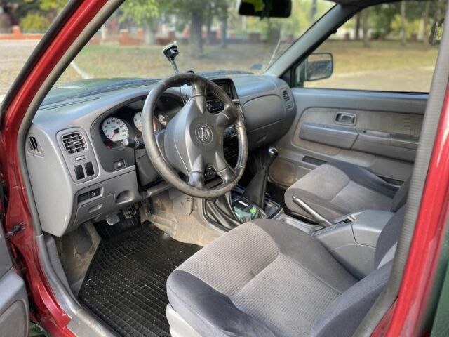 Зеленый Ниссан Навара, объемом двигателя 2.5 л и пробегом 286 тыс. км за 5200 $, фото 5 на Automoto.ua