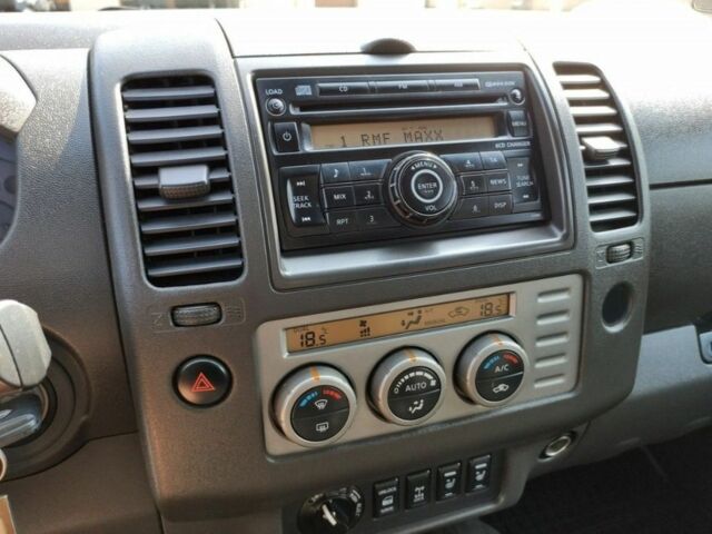 Зеленый Ниссан Навара, объемом двигателя 2.5 л и пробегом 220 тыс. км за 2479 $, фото 10 на Automoto.ua