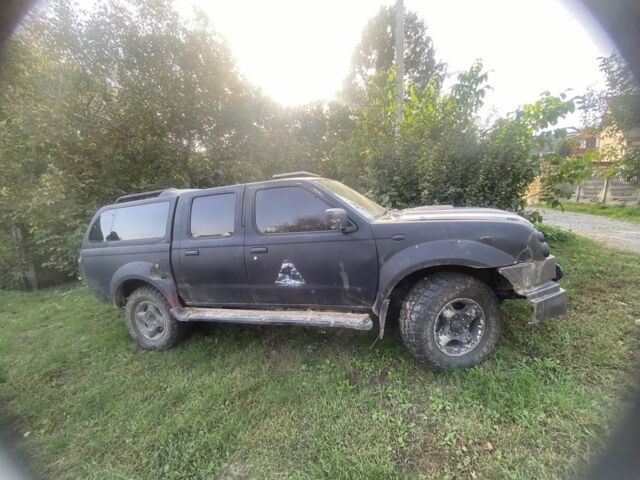 Зеленый Ниссан Навара, объемом двигателя 2.5 л и пробегом 170 тыс. км за 3900 $, фото 1 на Automoto.ua