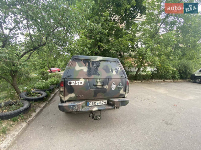 Зелений Ніссан Навара, об'ємом двигуна 2.49 л та пробігом 190 тис. км за 7000 $, фото 4 на Automoto.ua