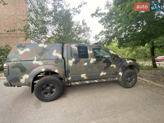 Зелений Ніссан Навара, об'ємом двигуна 2.49 л та пробігом 190 тис. км за 7000 $, фото 2 на Automoto.ua