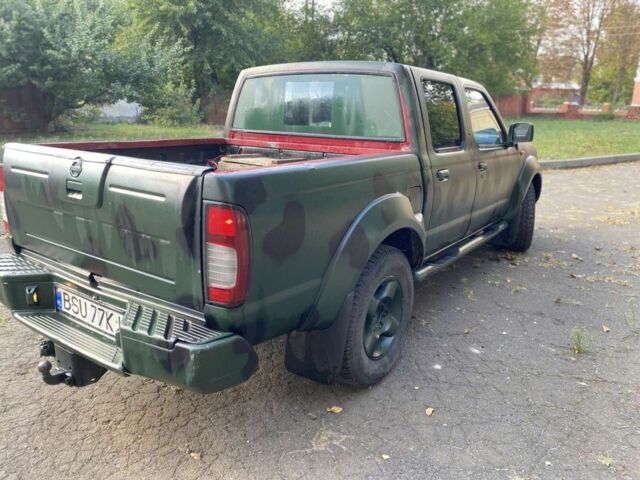Зеленый Ниссан Навара, объемом двигателя 2.5 л и пробегом 286 тыс. км за 5200 $, фото 1 на Automoto.ua
