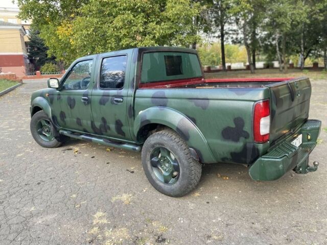 Зеленый Ниссан Навара, объемом двигателя 2.5 л и пробегом 286 тыс. км за 5200 $, фото 2 на Automoto.ua