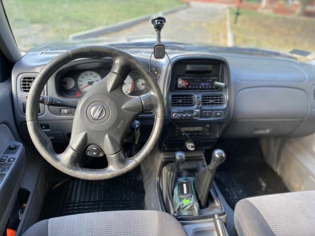 Зеленый Ниссан Навара, объемом двигателя 2.5 л и пробегом 286 тыс. км за 5200 $, фото 4 на Automoto.ua