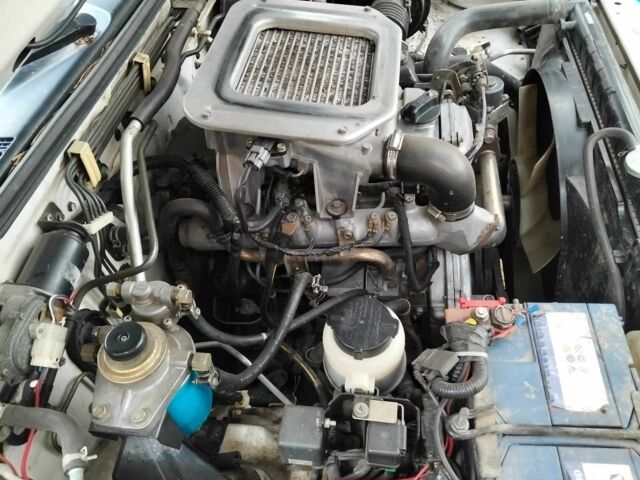 Зеленый Ниссан Навара, объемом двигателя 2.5 л и пробегом 261 тыс. км за 5001 $, фото 3 на Automoto.ua