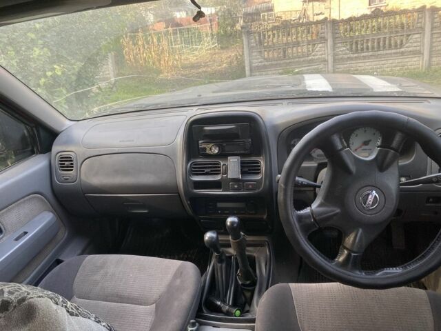 Зеленый Ниссан Навара, объемом двигателя 2.5 л и пробегом 170 тыс. км за 3900 $, фото 3 на Automoto.ua