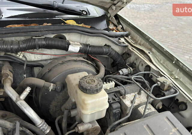 Зеленый Ниссан Навара, объемом двигателя 2.5 л и пробегом 300 тыс. км за 5800 $, фото 51 на Automoto.ua